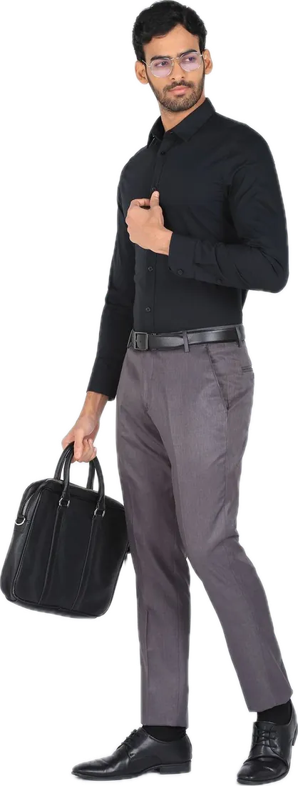 A black shirt with graphite wool-blend trousers and a leather holdall